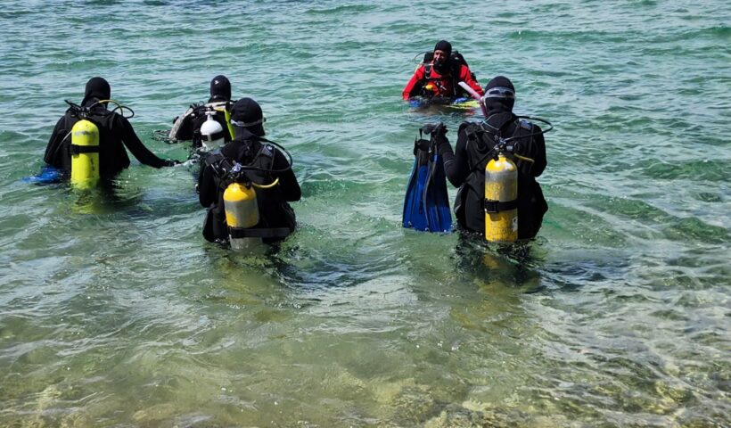 Open Water Scuba Diving Class Entering the Water in Lake Tahoe