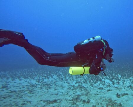 Diving with a closed circuit rebreather (CCR).