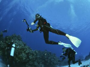 Diver checking her dive computer.