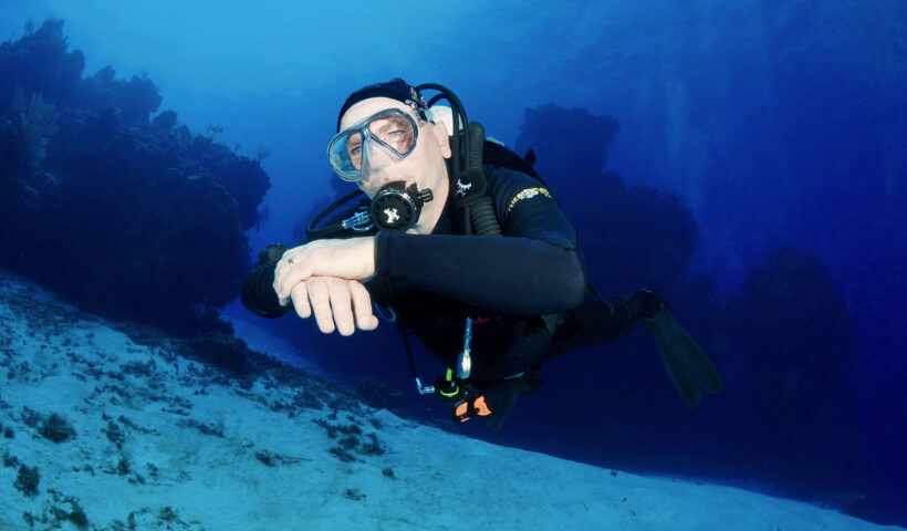 Scuba diver with perfect buoyancy control and trim.