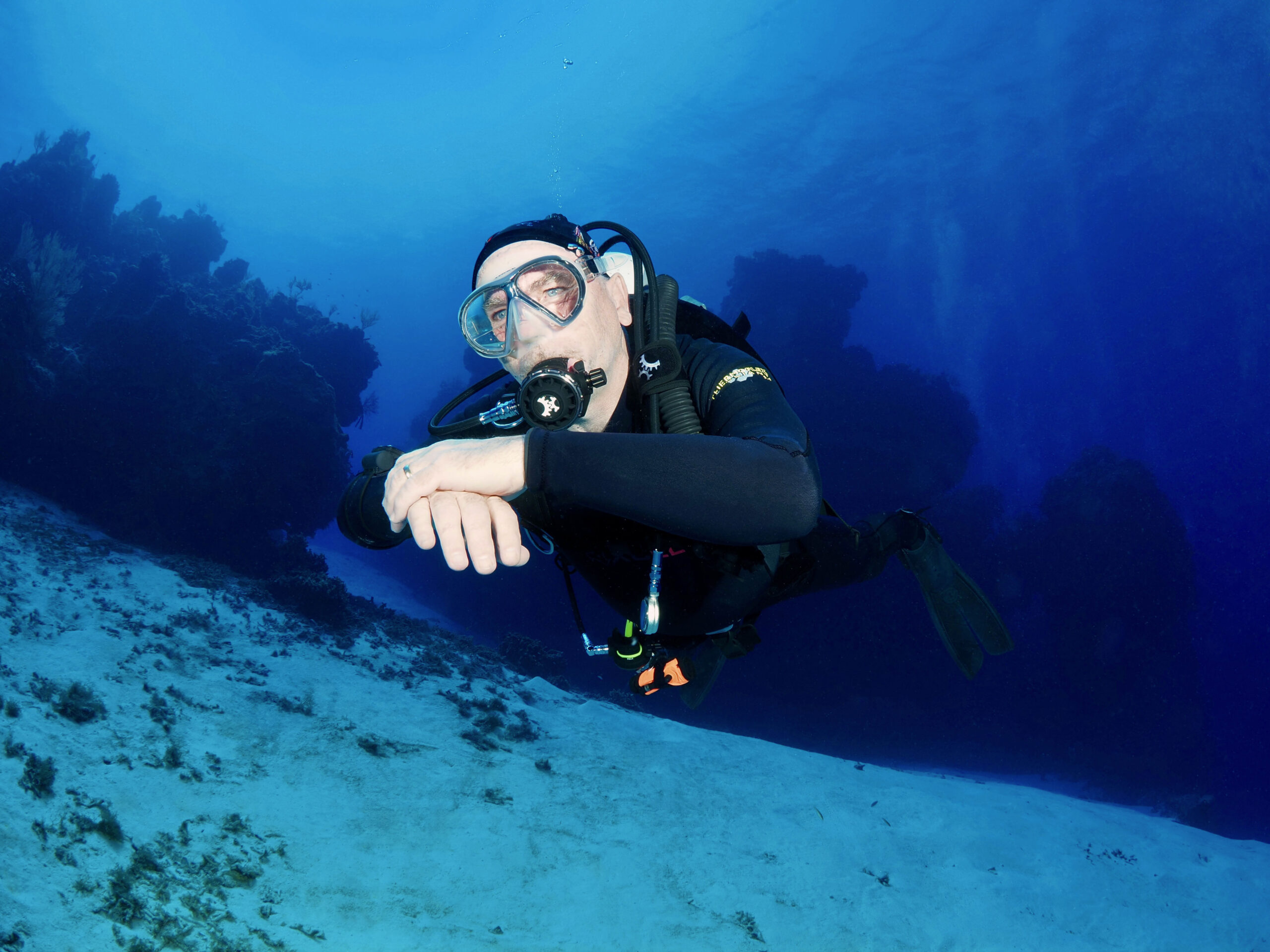 Scuba diver with perfect buoyancy control and trim.